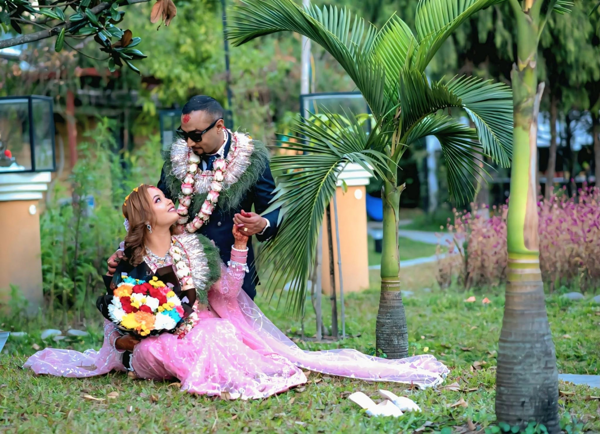 Newly married Nepali couple in the garden, photographed by New Quality Photo Studio, Bhaktapur